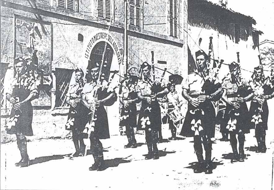 newspaper photo: C.B.H. pipe band in Italy